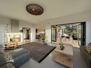 Full interior view of a luxury guest room suite with elegant styling at Views Over Wilderness guesthouse.