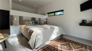 Main luxury bedroom setup featuring premium decor and spacious layout in Room 1 at Views Over Wilderness guesthouse.