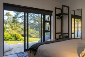 Spectacular scenic view looking out over the beautiful natural landscape from the private outdoor area of Room 4 at Views Over Wilderness guesthouse.